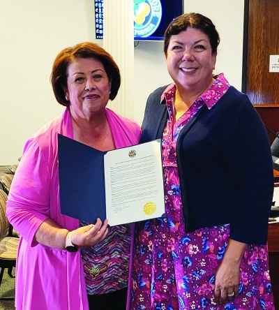 Local realtor Cindy Diaz-Telly (left) received a Fair Housing Proclamation from City Council Member Christina Villaseñor at Tuesday night’s council meeting.