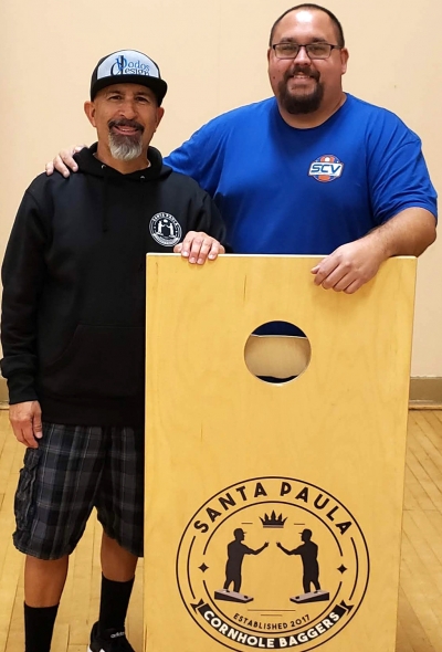 (left) Jesse Segovia of Santa Paula Cornhole Baggers, and Chris Plueger, both of these sponsors along with others are helping Brennon achieve his goal of becoming a Pro Cornhole Player.
