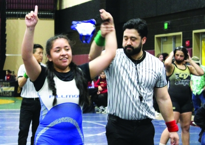Above is Fillmore’s Alexa Martinez raising her hands in victory as she was named CIF Champion for the 145lb weight class. Photo credit Torres and Karina Vergara.
