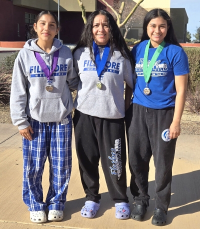 Above are Fillmore Flashes who placed in the CIF Northern Division Girls Wrestling Championships Naomi Bonilla, Sophomore placed 6th in the 11lb weight class, Alexa Martinez, Senior, Co-captain was named CIF Northern Division Girls Champion and Emma Torres, Co-captain placed 4th. Photo credit Torres and Karina Vergara.