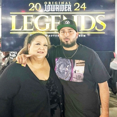 Above is Sonia Chessani with her son Alexz Chessani after receiving her award.