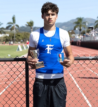 Pictured is Saul Fraga-Sandoval placed 1st in 10.84. He was also a medal winner, and awarded a special trophy, the Frank Wyckoff Trophy, for winning the Fillmore Varsity Boys 100. Photo courtesy Coach Anthony Chavez.