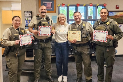 Pictured above are Ventura County Sherriff Deputies with Mountain Vista Elementary Principal Christine McDaniels, after reading to students in celebration of Read Across America.