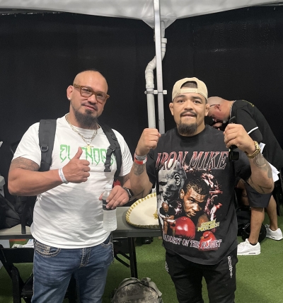 Pictured right is Jose “Froggy” Estrada along with his Coach Brain Espinoza after the match. Photo credit Joe Woods.