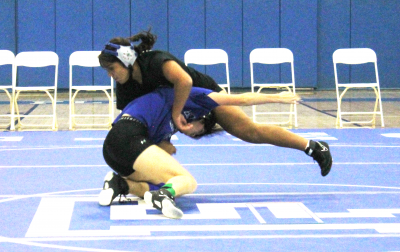 On Wednesday, November 13, 2024, FHS Boys & Girls wrestling competed in their 1st annual intra-squad scrimmage. Above is Naomi Bonilla vs. Delilah Cervantez. Inset, Tony Lemus vs. James Alcantar. Photo credit Yoseline Cruz.