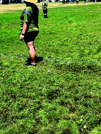 Marsh-like field conditions at Two Rivers Park make playing and walking a challenge on the uneven, muddy surface.