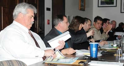 Council members sat in a large circle with audience members at the