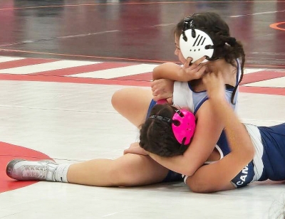 Above is the Fillmore Flashes Sophomore Yoseline Cruz dominating during her match against Elisa Velasquez of Camarillo High School. Photos credit Jimmy Torres Jr.