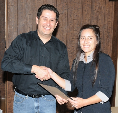 Coach Kimberly Tafoya received recognition from Board Member Garnica.