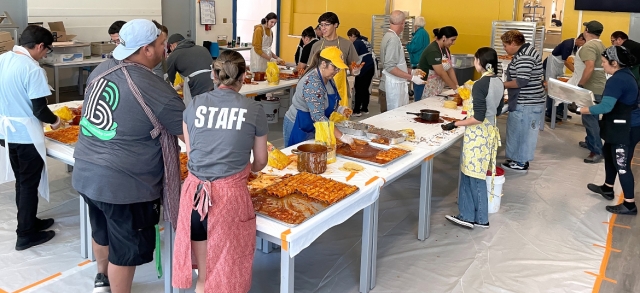 On Saturday, November 1st, Fillmore Lions Club will host their annual Enchilada Dinner. Above is last year’s dinner assembly line which made 1500 dinners. Photo credit Brett Chandler.