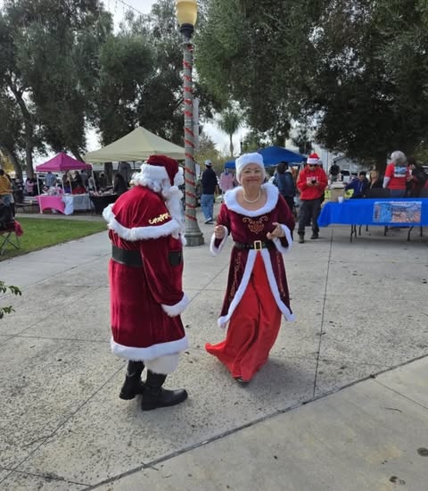 On Saturday, December 14, 2024, the streets of Piru were filled with folks gathering for the 46th Annual Piru Christmas Parade & Festival. Above is Mr. & Mrs. Claus dancing at the festival, getting the festival started at the Train Depot. Photo credit Ken Wiseman, President Piru Neighborhood Council.