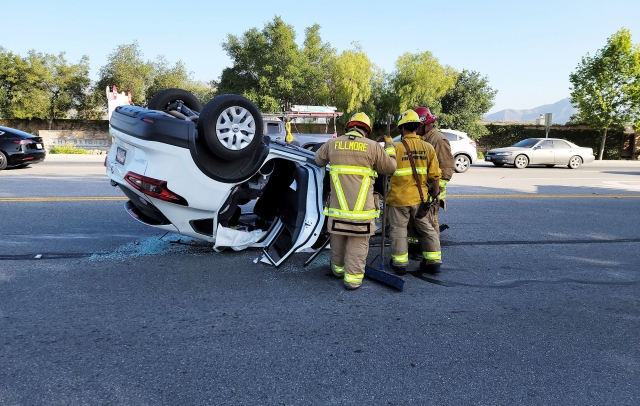 On Tuesday, May 27th, at 5:26 p.m., the Fillmore Police Department, Fillmore City Fire, Ventura County Fire Department, and AMR Paramedics were on-scene investigating multiple vehicle’s involved in a collision at the intersection of Ventura Street and Mountain View Street. Arriving firefighters reported five vehicles involved, including one vehicle on its roof. The driver in the overturned vehicle was arrested for DUI. Minor injuries were reported. The crash scene caused traffic on Ventura Street to back up for several hours.