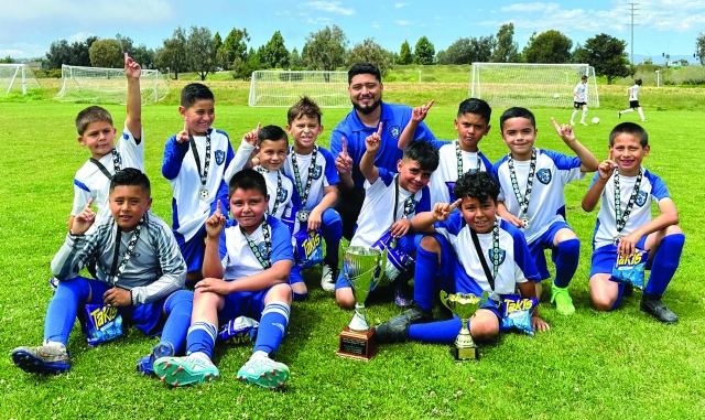 On Saturday, May 11, 2024, Fillmore’s California United’s 2016 Boys Team traveled to Ventura Community Park and clinched the NP Elite Spring League Title. Pictured above top: Nevo Sasson, Jayden Escoto, Allen Arriaga, Noah Lira, Coach Miguel Martinez, Adrian Marrufo, Roman Garibay, and Nick Aguilar. Bottom: Andres Martinez, Gera Alvarado, Rex Masterson, and Kevin Ponce. Thank you to Coach Miguel Martinez and assistants Josue Garcia and Javier Alcaraz. Photo credit Alicia Arriaga.