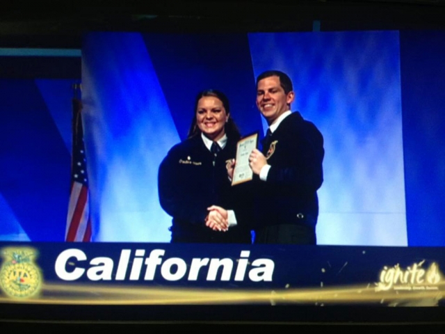 Candace Stines receiving her American Farmer Degree at the Kentucky Fair and Expo.