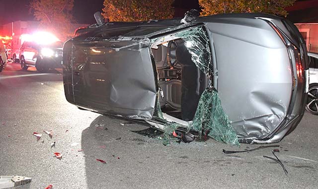 On Monday, July 20, at approximately 11:37 p.m., the Fillmore Police Department, Fillmore City Fire Department, and AMR Paramedics responded to a reported single-vehicle traffic collision at Third Street and Central Avenue. Upon arrival, deputies located a vehicle on its side with three occupants inside. The vehicle had also struck two parked vehicles, causing damage. Due to the number of patients, a second ambulance was requested to assist at the scene. All three occupants were transported to a local hospital. Photo credit Angel Esquivel.