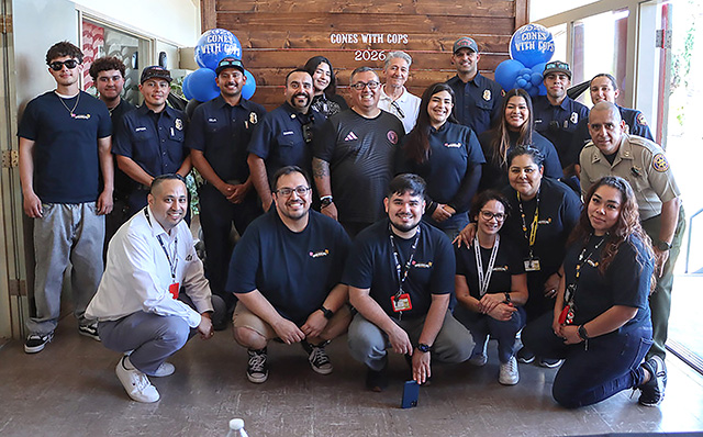 On Wednesday, April 15, One Step A La Vez hosted “Get the Scoop, Cones with Cops”. All members of the community were welcome and enjoyed free ice cream from Mister Softee. They also learned more about One Step A La Vez, including summer programming available to those 13-19 years of age. Fillmore Patrol Services were there with the community getting aquatinted over a soft-serve cone. Photo credit Angel Esquivel.