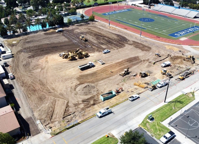 Above is the current construction site for the new Fillmore High Athletic Complex which is in full effect. The construction site is scheduled to be completed in December 2026. The brand-new 43,000 square-foot athletic complex that will serve Fillmore’s high school students. Online at www.FillmoreGazette.com are original photos attached along with other construction photos and construction information. Inset, a rendering of what the final project will look like.
