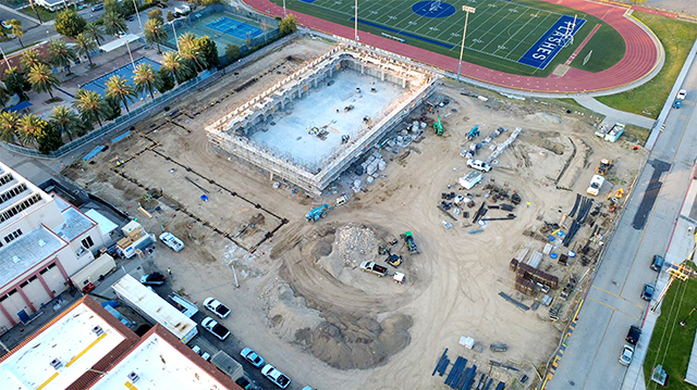 Fillmore High School’s new Athletic Complex has been busy under construction, with multiple crews moving in and out daily. Above is an aerial view of the site with the old gym in the bottom left, and the Flashes football field at top right.