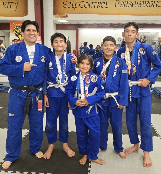 On Saturday, November 9, 2024, Fillmore Jiu-Jitsu Club took part at the American Grappling Federation (AGF) Antelope Valley Open where several athletes competed earning multiple medals. Pictured (l-r) are Professor Michael Torres, Mateo De La Cruz, Maya Ramirez, Jacob Ramirez, and Aiden Ramirez. Photo credit Dayana Ramirez.
