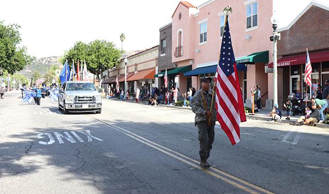 Tuesday, November 11, 2025, was the annual Fillmore-Piru Veteran’s Day celebration on downtown Central Avenue. The Fillmore & Piru communities gathered to honor the brave men and women who have served our country. The Veteran’s Day Parade featured local organizations, Fillmore High School marching band, community groups, and honored veterans. Leading this year’s parade as Grand Marshal was Mark Dominguez, a retired U.S. Army Staff Sergeant and interim Fillmore Police Chief and Peace Officer, recognized for his exemplary service to both his country and community. A luncheon followed at Fillmore Middle School with 130 in attendance. Photo credit Sebastian Ramirez.