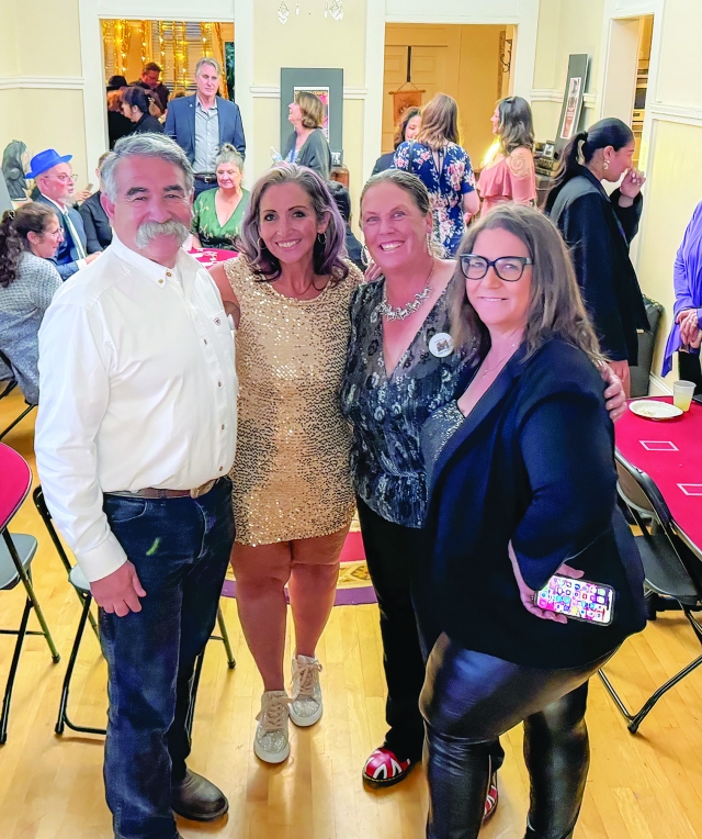 On Friday, May 10, 2024, the Fillmore Women’s Service Club hosted the Susan Banks Memorial Fundraiser in order to raise scholarships for Fillmore High School students. Pictured above is Fillmore Chief Keith Gurrola, Elect 2nd Vice Ways and Means FWSC Brandy Hollis, Current Ways and Means FWSC Taurie Banks (Susan Banks’ daughter), and Danielle Quintana, Current President FWSC, at this year’s event.