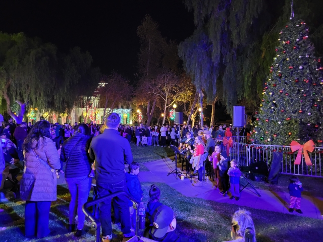 On Sunday, December 1, 2024, the City of Fillmore hosted its Annual Tree Lighting & Night Market from 5pm – 8pm. Folks came to enjoy music, shopping, games, food, built gingerbread houses, take photos with Santa, enjoy a snow play area and more. The event was a big hit with Fillmore’s Central Park filling with families and friends to watch the lighting of the Christmas tree at 6pm. More photos on page 10. Photo credit Gazette staff.