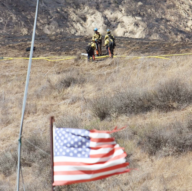 Firefighters work the Canyon Fire hotspots near Lake Piru. The Canyon Fire, which has burned more than 5,000 acres on the Los Angeles-Ventura County line and destroyed two homes, was 97% contained Wednesday as crews worked to completely encircle the non-injury blaze. By Wednesday the majority of personnel on the incident will be released because of the progress that’s been made on this fire, Los Angeles County Fire Department Public Information Officer Fred Fielding told City News Service. Fire officials used 960 personnel, 92 engines, 28 crews and 12 dozers to battle the blaze at its height. The resources assigned allowed fire officials to effectively stop the blaze at 5,370 acres. Crews have been making steady progress encircling the fire in an area east of Lake Piru since it broke out on Thursday, 08/07/25. The northeast section of the fire remains the hottest area. Photo credit Sebastian Ramirez.