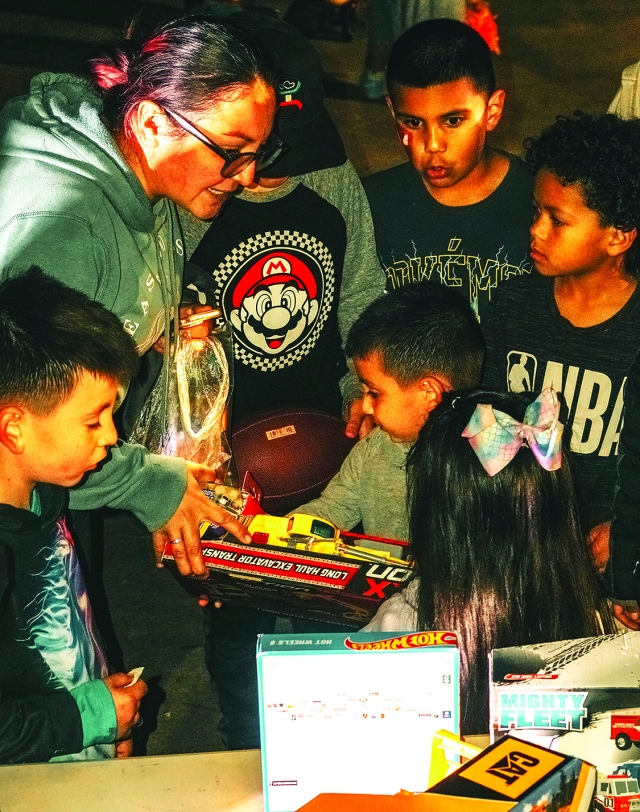 On Saturday, February 15, 2025, a free community event was held on Lemon Way, where over 150 folks gathered. More than 60 toys and bikes were raffled for the kids to win. Pictured are the children receiving their prizes. Pastor Ernie Rangel held a free community event on Saturday, February 15, 2025, at Lemon Way Park, in Fillmore. This was a free event where over 150 people, and more than 60 toys and bikes, were raffled for the kids. Pastor Ernie said, “I grew up in these streets of Fillmore back in the day where my parents didn’t have love for me, so I decided to choose gangs, violence and drugs than to be at home. I want these kids and this community to know that there is a church and a team that care for them and love them, this is why I do this”. Photo credit Pastor Ernie Rangel.