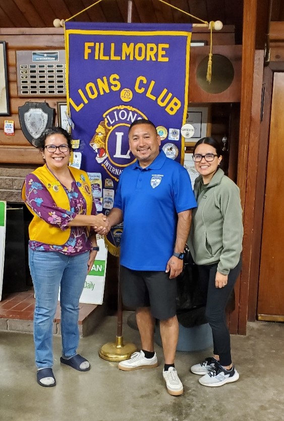 Fillmore’s AYSO 242 Regional Commissioner Arnold Munoz and AYSO Registrar Gaby Santa Rosa accept a check from Fillmore Lion’s Club President Jaclyn Ibarra, having recently celebrated their 45 Anniversary season. Pictured (l-r) are Fillmore Lion’s Club President Jaclyn Ibarra, Arnold Munoz and AYSO Registrar Gaby Santa Rosa.