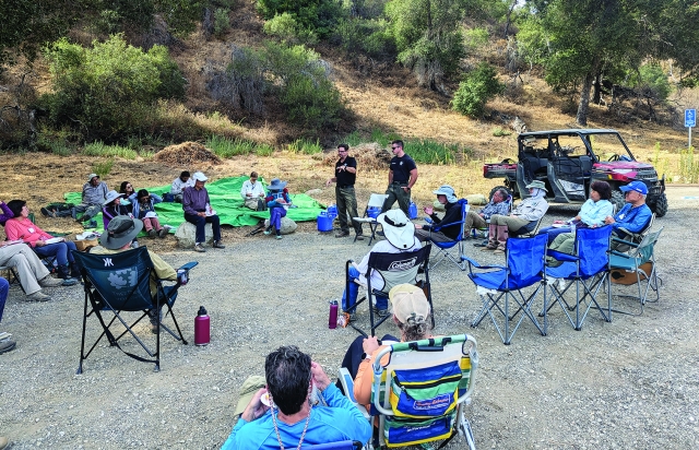 Pictured are local Piru rangers giving a talk to the volunteers about the local history and wildlife. Inset, volunteers counting tamarisk for data collection. Photos courtesy John Ziegler, Marketing Manager, Channel Islands Restoration. 