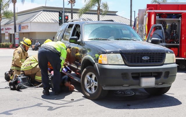 On Saturday, June 14th, at 12:43 p.m., the Ventura County Sheriff’s Office, Fillmore City Fire, and AMR Paramedics responded to a vehicle versus motorcycle crash at Ventura Street and Olive. Arriving firefighters found a black Ford Explorer and a motorcycle with two riders. One patient was located underneath the passenger side of the vehicle, while the second patient was treated by firefighters. A second ambulance was also requested. Both riders were taken to a local hospital, Condition Unknown. Photo credit Angel Esquivel.