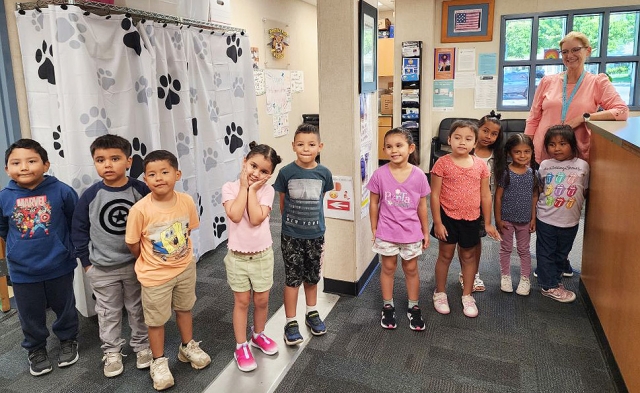 Mountain Vista Elementary Principal Christine McDaniels said, “Kindergarten Bootcamp students tour the office to meet Miss Erica, Miss Mirna, and Miss Diana. We are here to help you! Courtesy https://www.facebook.com/permalink.php?story_fbid=pfbid0TSvDj9fgsPa91Pmejmvcb4fXatH43GNoRmUCwqmuGUoH4V51BFjLWhQVFVbDKQcxl&id=100063493185283.