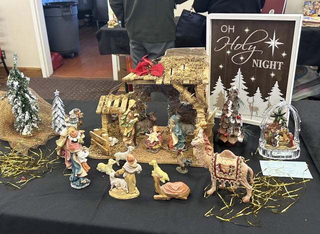 Saint Francis of Assisi Roman Catholic Church held their yearly Christmas Advent manger display on Sunday, December 15th. Pictured is the life-size manger in the main sanctuary, presenting the holy family at Christ’s birth. Inset, one of the many manger scenes available for viewing. Photo credit Gazette staff.