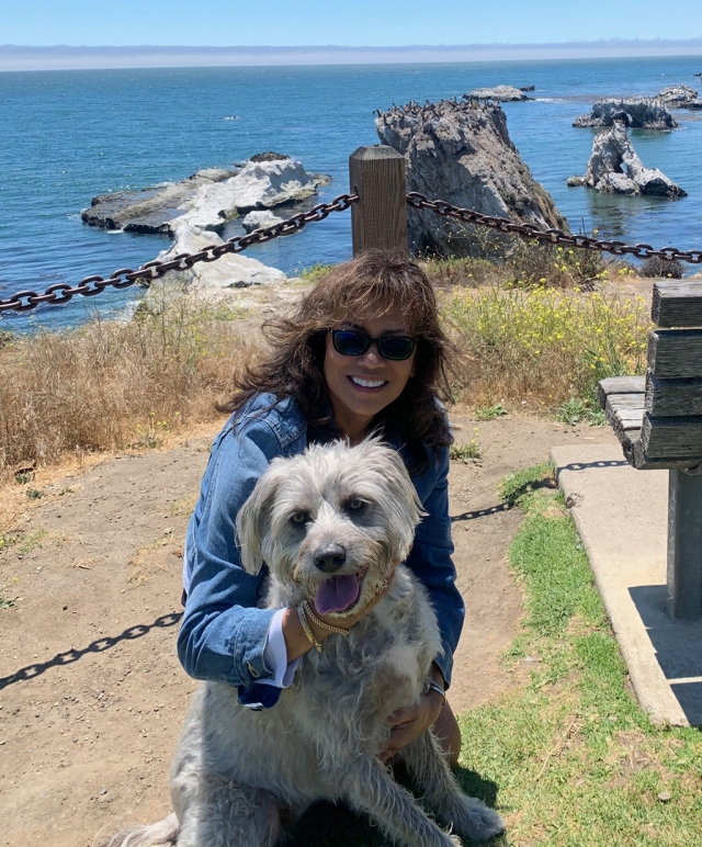 Faces of Fillmore writer Carina Montoya and her best friend Scruffy.