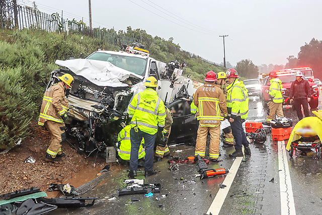 On Monday morning, February 16, authorities responded to a two-vehicle crash on westbound SR-126 and Pyle Road involving a white Ford work truck and a black Tesla. Once on-scene one man had to be air lifted for his injuries, one person was pronounced DOA and a third suffered minor injuries and was transported to the hospital by ambulance. Inset, firefighters using the Jaws of Life. Photo credit Angel Esquivel.