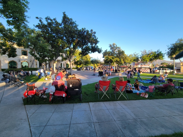 On Friday, July 26, 2024, Fillmore residents gathered blankets and chairs to sit out in front of City Hall and enjoy Fillmoreâs Summer Music Festival which began July 19th and will take place on Fridays until August 30th from 6pm -8pm. Last week, folks heard live music by The Wonder Brothers, followed by DJ Danny Ibarra.