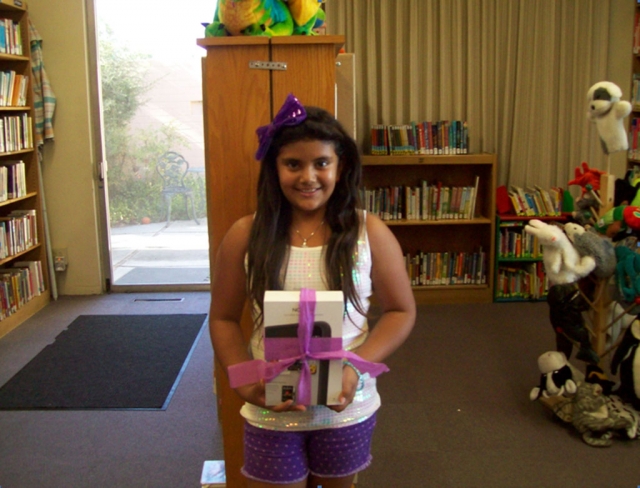 (above) Yazmeen Del Toro. Reading was so Delicious at the Fillmore Library this summer. 520 reading logs were returned. That means that the youth of Fillmore read a total of 2,600 hours this summer. Congratulations everyone.