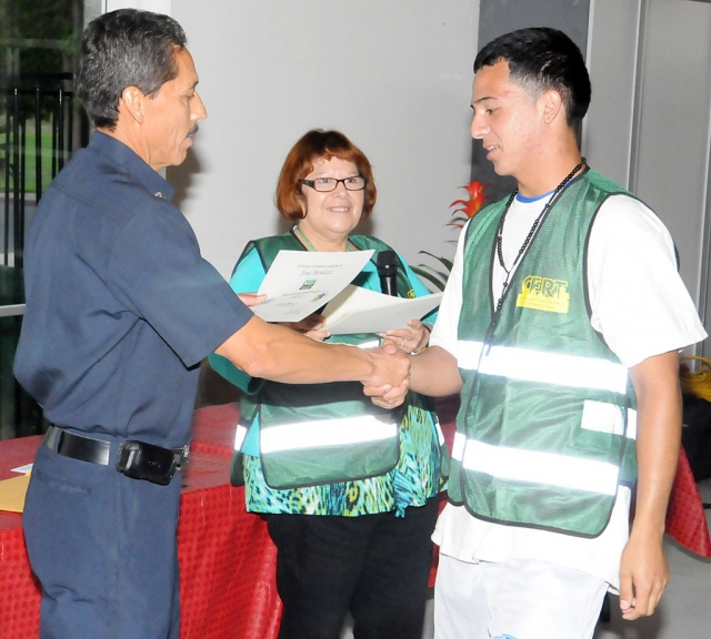 Jesus Mendoza receiving his diploma.