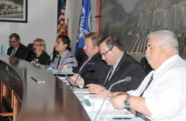 From left, City Manager Rico Landereos, Council members Diane McCall, Mayor Pro Tem Manny Minjares, Mayor Rick Neal, Doug Tucker, and Steve Conaway announce the successful settlement of the controversial Sales Tax Revenue Sharing Agreement. This agreement will assure that Fillmore will receive approximately $700,000 to
$1 million each year until 2023.