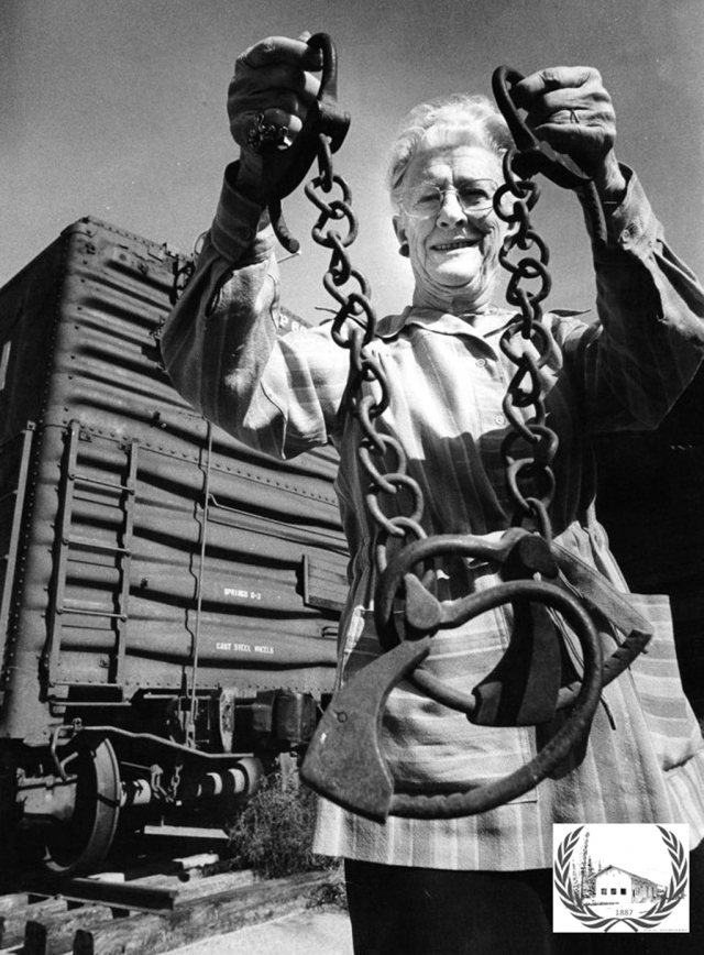 Pictured is Edith Jarrett holding leg irons in front of Museum's 1953 model boxcar which now serve as the Museum annex [now used for storage for the Museum]. Photos courtesy Fillmore History Museum.