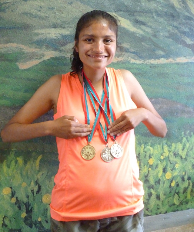 On the weekend of June 8, 2013 Fillmore’s very own Anna Maldonado competed in the 2013 Special Olympics Summer Games. She competed against many athletes and brought home 2 Gold medals and 1 Silver. Maldonado earned the gold medals in the 1500 run 6:38 and the Running Long Jump. The Silver was in the 800 run 3:08. Maldonado was even featured on the Special Olympics Program. Great Job Anna.