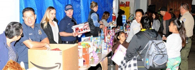 On Saturday, December 17th from 9am to 12pm, the Fillmore Fire Foundation will be hosting their 2022 Community Holiday Giveaway at 711 Landeros Lane in Fillmore. See article for more details. Above, a previous Holiday Giveaway with firefighters and volunteers handing out toys.