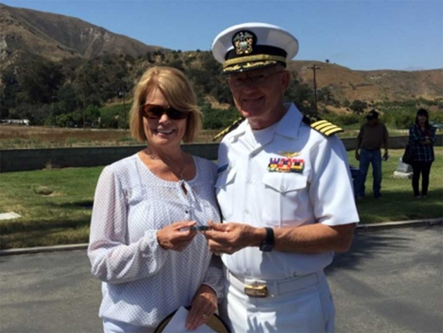 Debbie Crain Anderson, Class of 71 and wife of Robert (Bob) Anderson, Class of 67 who both grew up in Fillmore and graduated from Fillmore High School presenting Captain Charlie Plumb with the POW bracelet she wore. “What an honor it was to get the opportunity to meet Captain Plumb. Such an honor. I got the bracelet when we were stationed on Guam when Robert was in the Marine Corps. We had just come from the Philippines. I got a bracelet. I wore it, never taking it off until one night we were watching the news. They were covering a flight of released POW’s. As each one walked off the plane their name was called. We got to see Captain Charles Plumb walk off that plane. It was as beautiful and heartwarming then as it was today to get to give him the bracelet that I had not taken off since the day I got it. Our men and women who have served and who serve now, those who suffered in POW camps, our MIA’s, those who have come home missing limbs, those who have returned home and those who did not make it home - they are the heroes. They have all paid the ultimate sacrifice. Thank you to them and their families. Let us NEVER FORGET.”