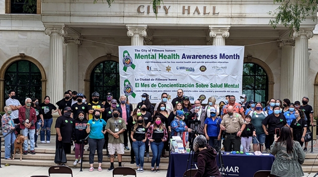 On Saturday, May 15th, the City of Fillmore and National Alliance on Mental Illness (NAMI Ventura County) hosted a Mental Health Awareness and Social Services Resource Fair in front of Fillmore’s City Hall. The fair was to help erase the stigma surrounding mental health and share information about mental health resources with Fillmore and Piru residents. Activities included a community bike-ride/walk, followed by a mental health and social service resource fair and a community-led sharing of stories to raise awareness about mental health. Pictured above is a group photo of all who participated in this past weekends events. Inset, a group getting ready head out for the Bike-Ride/Walk to support mental health awareness. Photos courtesy Fillmore City Council Member Christina Reyes-VillaSenor.