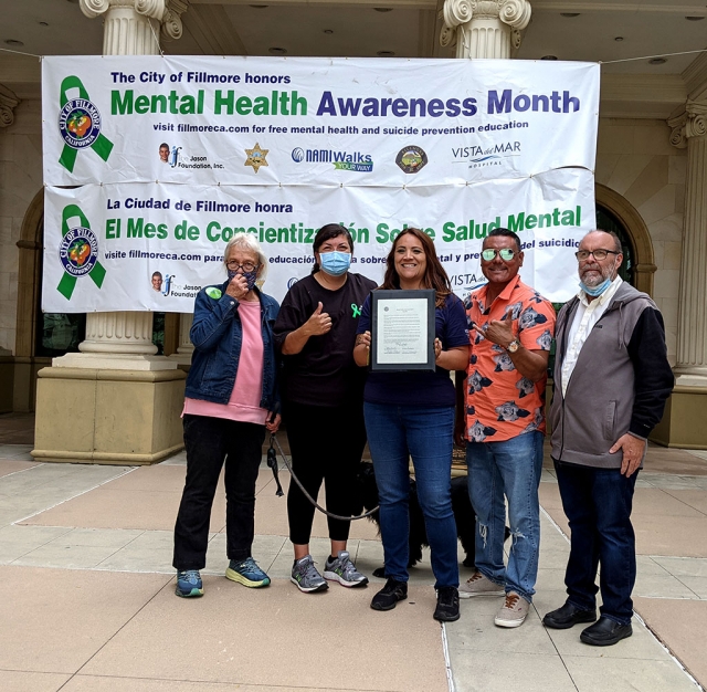 On Saturday, May 15th, the City honored Mental Health Awareness Month by hosting a Mental Health Fair in front of Fillmore City Hall. Pictured are Council Members Lynn Edmonds, Christina Villaseñor and Mayor Mark Austin presenting the Mental Health Awareness proclamation to Maya Lazos, Ventura County NAMI Walks 2021 Captain. Also pictured is Dylan Garcia, local musician and singer and mental health advocate.