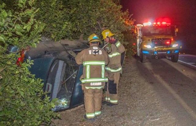 On Friday, July 29th, 2022, at approximately 9:17pm, California Highway Patrol, Ventura County Fire, and AMR Paramedics were dispatched to a reported traffic collision in the 1900 block of Old Telegraph Road, Fillmore. Arriving fire crews reported a single patient with one vehicle on its side against an orange tree. One patient suffered minor injuries; CHP requested a tow truck. Photo credit Angel Esquivel—AE News.