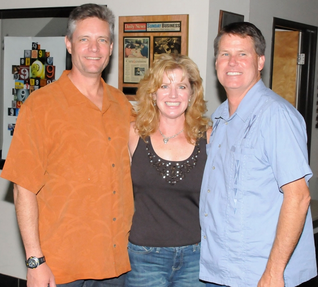 Exiting Police Chief Tim Hagel, right, was honored at a going-away party last week. Pictured with Hagel is Monica McGrath, Fillmore’s new Chief, shown with her husband.