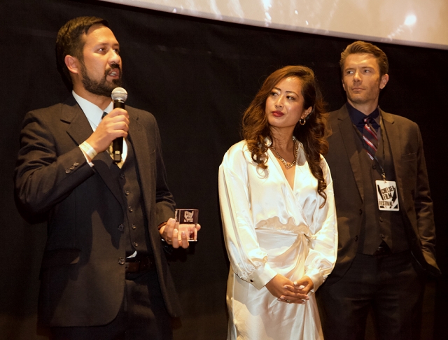 (l-r) FHS Teacher Randal Kamradt, Star Georgina Tolentino, and Co-Star Ian Coleman receiving the Audience Award from the Chelsea Film Festival in New York for his fifteen-minute short film "No Dogs."