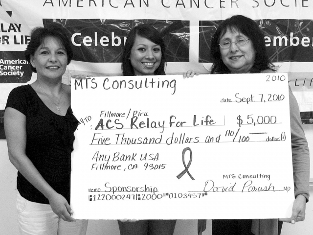 Pictured above, left, Councilmember Laurie Hernandez presented a check from MTS Consulting for $5,000. to American Cancer Society Chair Faith Lugo (right) and Melissa Hernandez (center) on Tuesday, September 7.