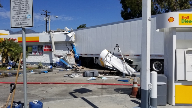 On April 19th, 2022, at 10:14 a.m., the Fillmore Sheriff’s Office, Fillmore Fire Department (ME191), Ventura County Fire (RE27) and AMR Paramedics were dispatched to a reported semi-truck into the Shell Gas Station located at Ventura Street (SR-126 )and Santa Clara Street. According to Fillmore Fire Chief Keith Gurrola the semi was traveling westbound on Ventura Street, drove through a power pole and a large Palm tree, crashed into a parked car and struck at least two diesel gas pumps before crashing into the east side of the station, stopping half way in. A male patient suffered minor injuries and was transported to the hospital by AMR Paramedics--the store clerk was not injured. The gas station attendant acted quickly to shut down all the gas pumps before exiting the building, according to Chief Gurrola. There were no spills from the pumps, but the semi's 40-gallon tanks were ruptured and the store was red tagged by Building & Safety. Edison and SoCal Gas inspected the sight for powerline and natural gas issues-- none were immediately found. Fillmore Sheriff ’s Office is investigating the crash. Information courtesy Angel Esquivel-AE News.